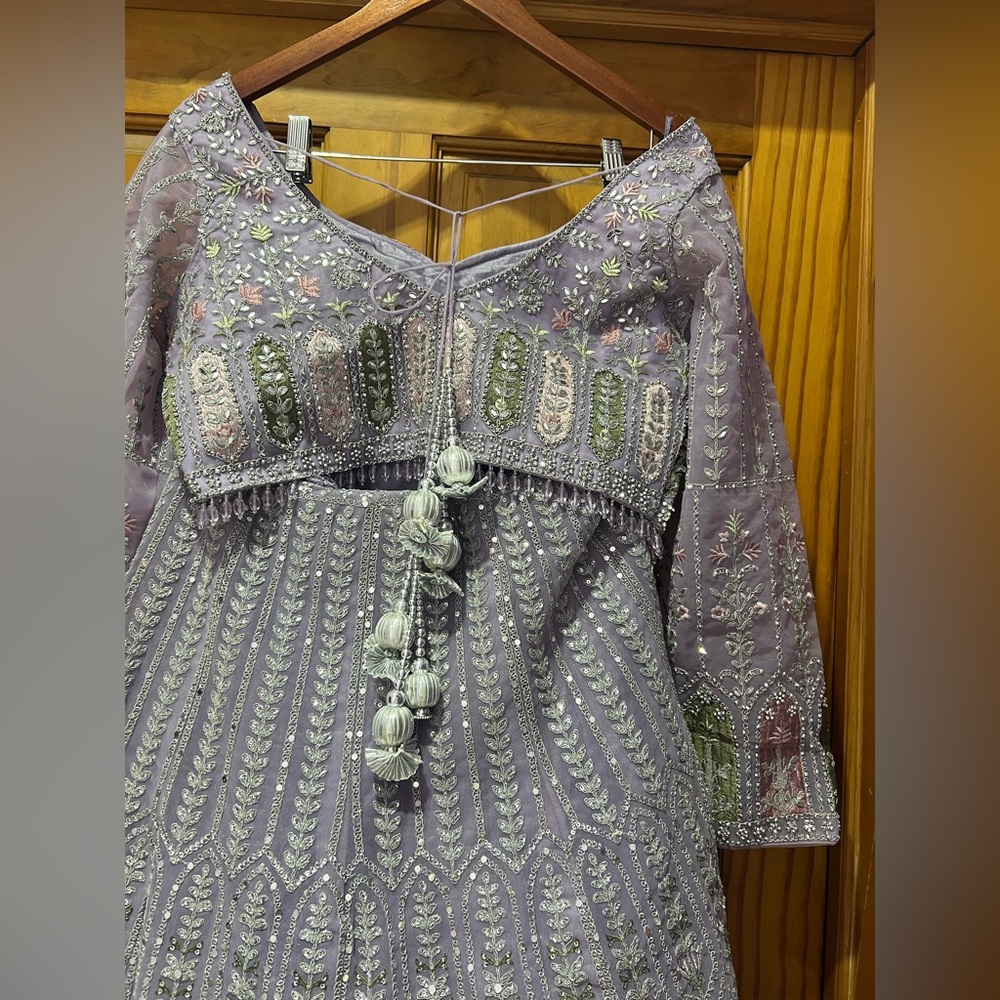 Beautiful full sleeves Lavender lehenga with mirror work. - Picture 3 of 4